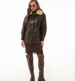 Стильный облегченный пуховик из кожи 