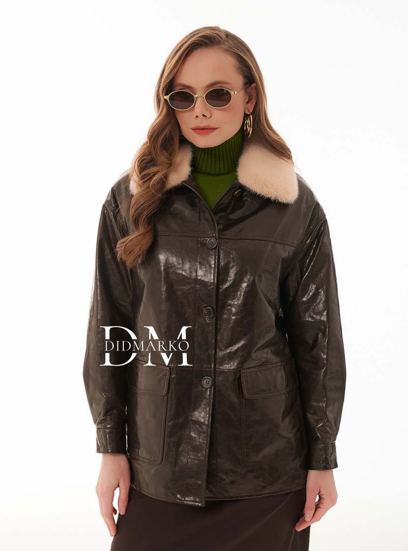 Стильный облегченный пуховик из кожи 